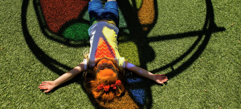 Girl laying on synthetic turf